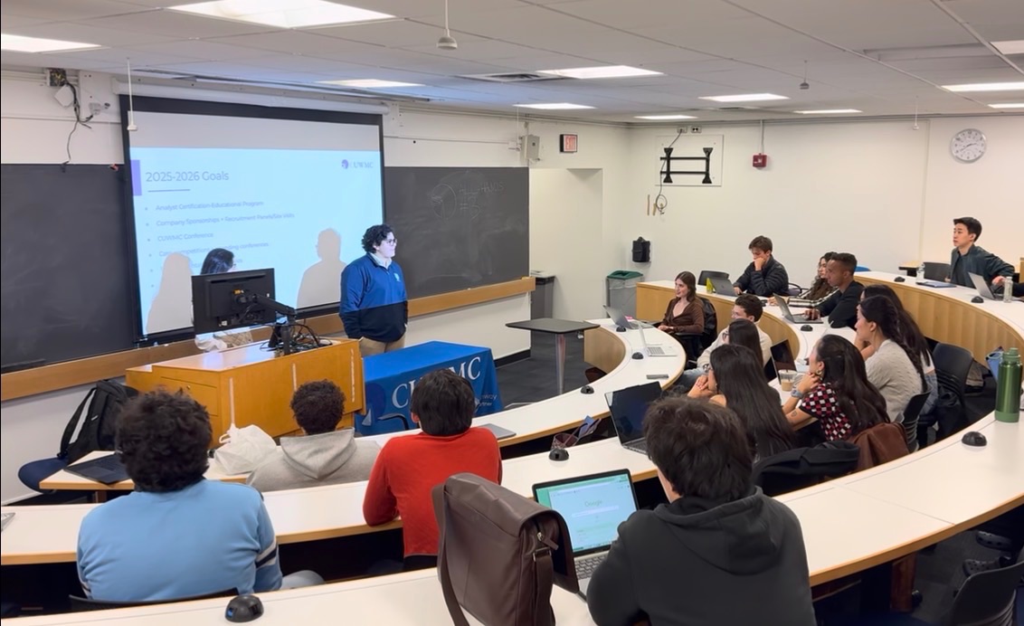 Kyle leading a wealth management workshop for a student club