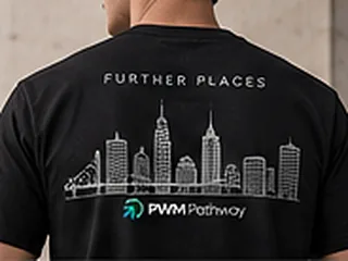 Concept rendering: the back of a black T-shirt with a line-drawn skyline and the words Further Places.