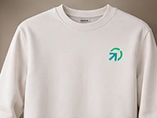 Concept rendering: a white crewneck sweatshirt with a small PWM Pathway mark on the chest.